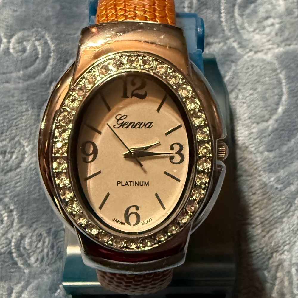 Geneva Women's Watch with Orange Strap and Silver Accents